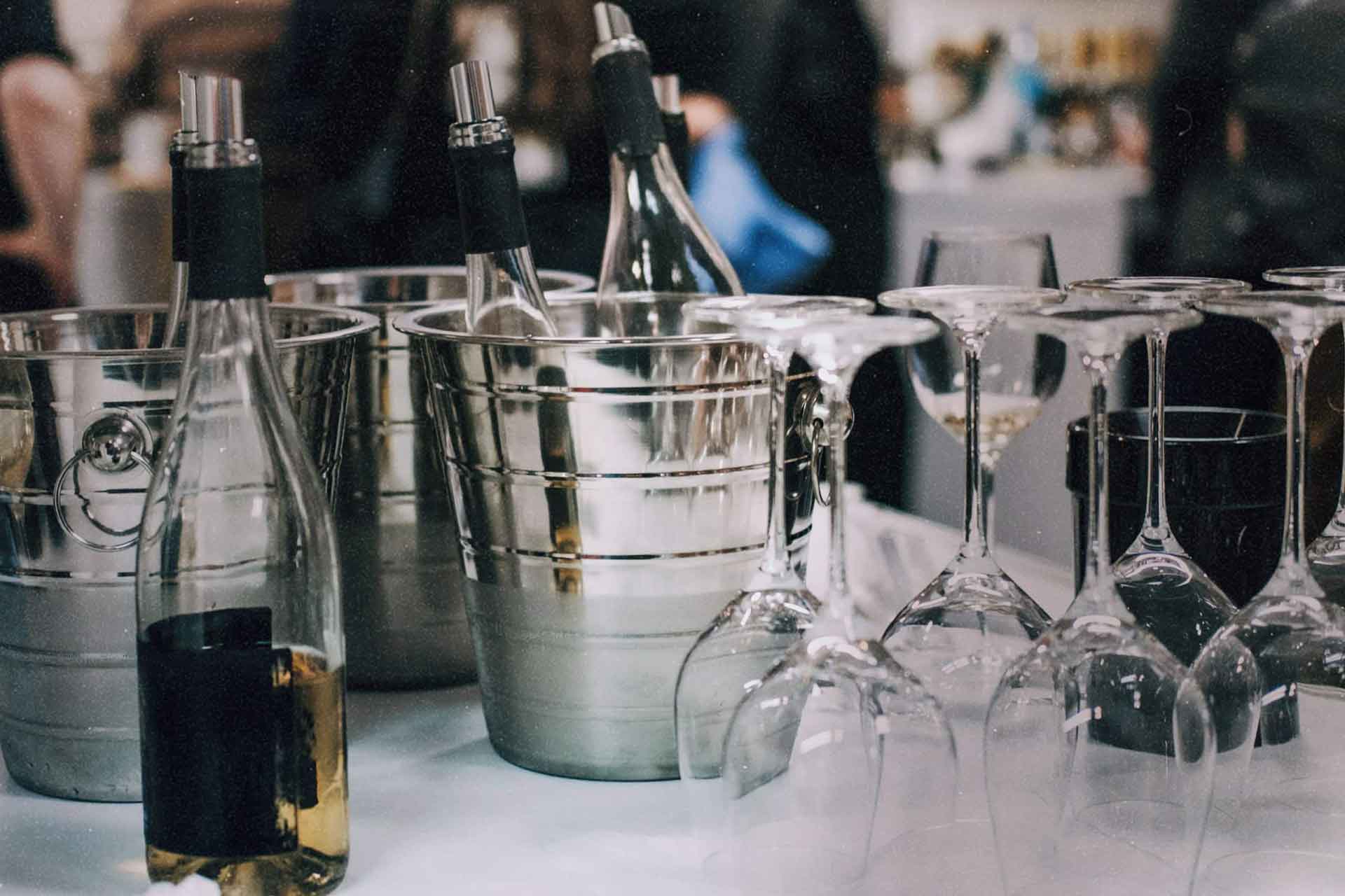 Chilled wine and champagne buckets at a fully staffed Golden Service bar station in Nova Scotia.